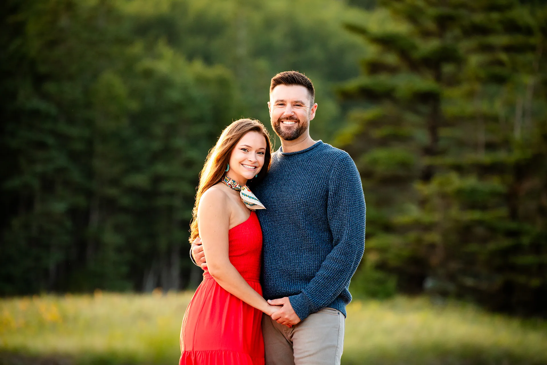 maine family photography daehler 13 A man and woman smile and pose during a family portrait session on Sand Beach in Acadia National Park near Bar Harbor, Maine.