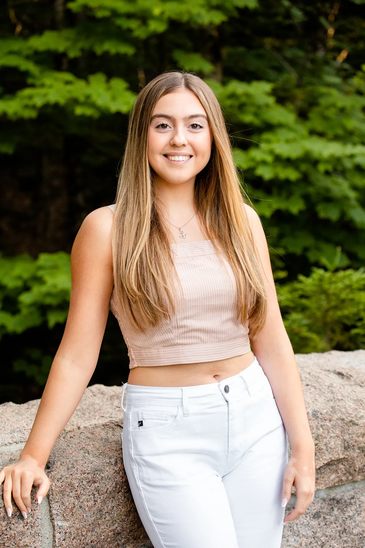 maine senior photography brooke 04 A girl smiles and poses during a portrait session at Jordan Pond in Acadia National Park near Bar Harbor, Maine.