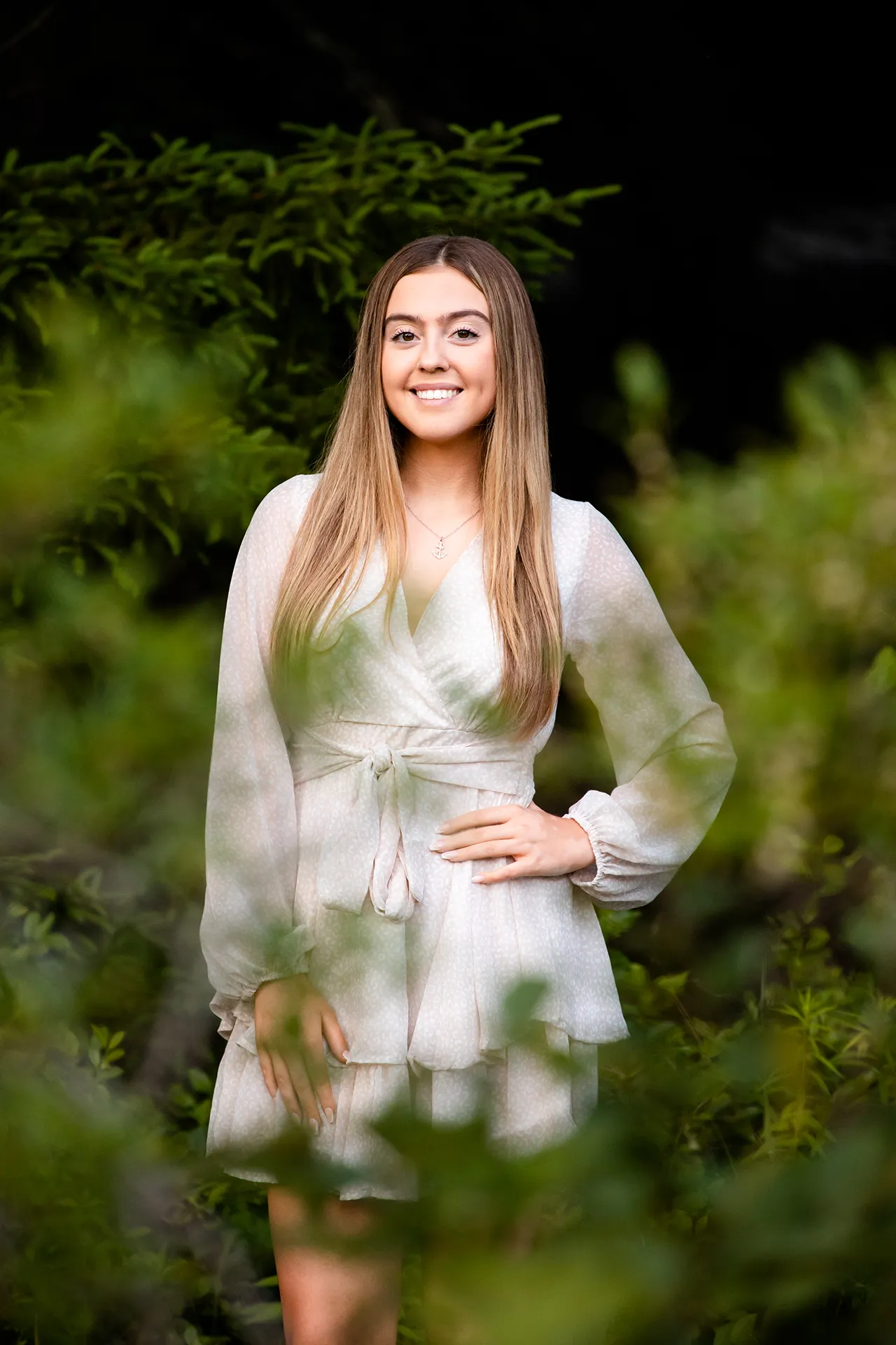 maine senior photography brooke 10 A girl poses in the woods during a senior portrait session at Jordan Pond in Acadia National Park near Bar Harbor, Maine.