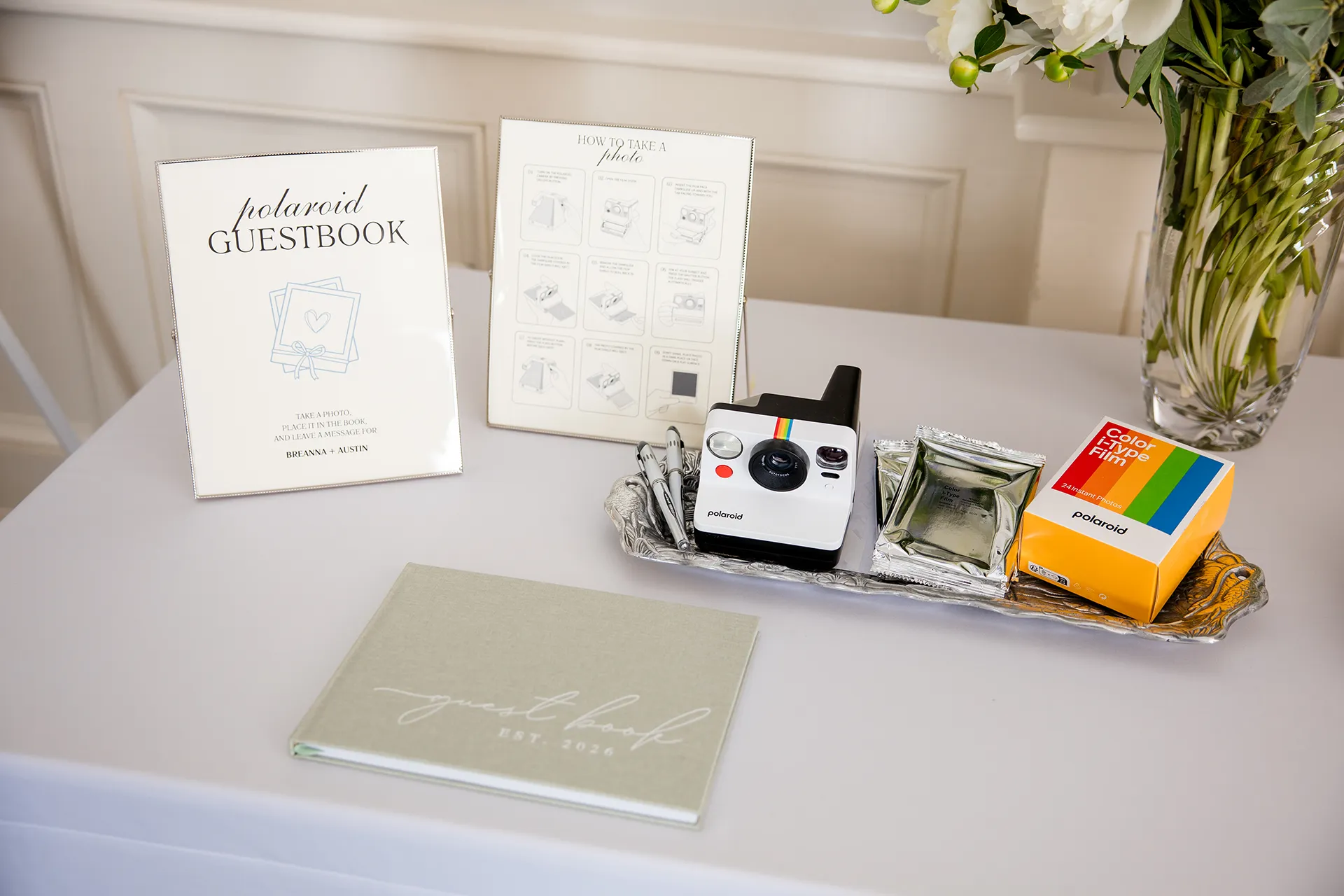 A closeup of a guest book table for a wedding reception in the Porcupine Room at the Bar Harbor Inn and Spa in Maine.
