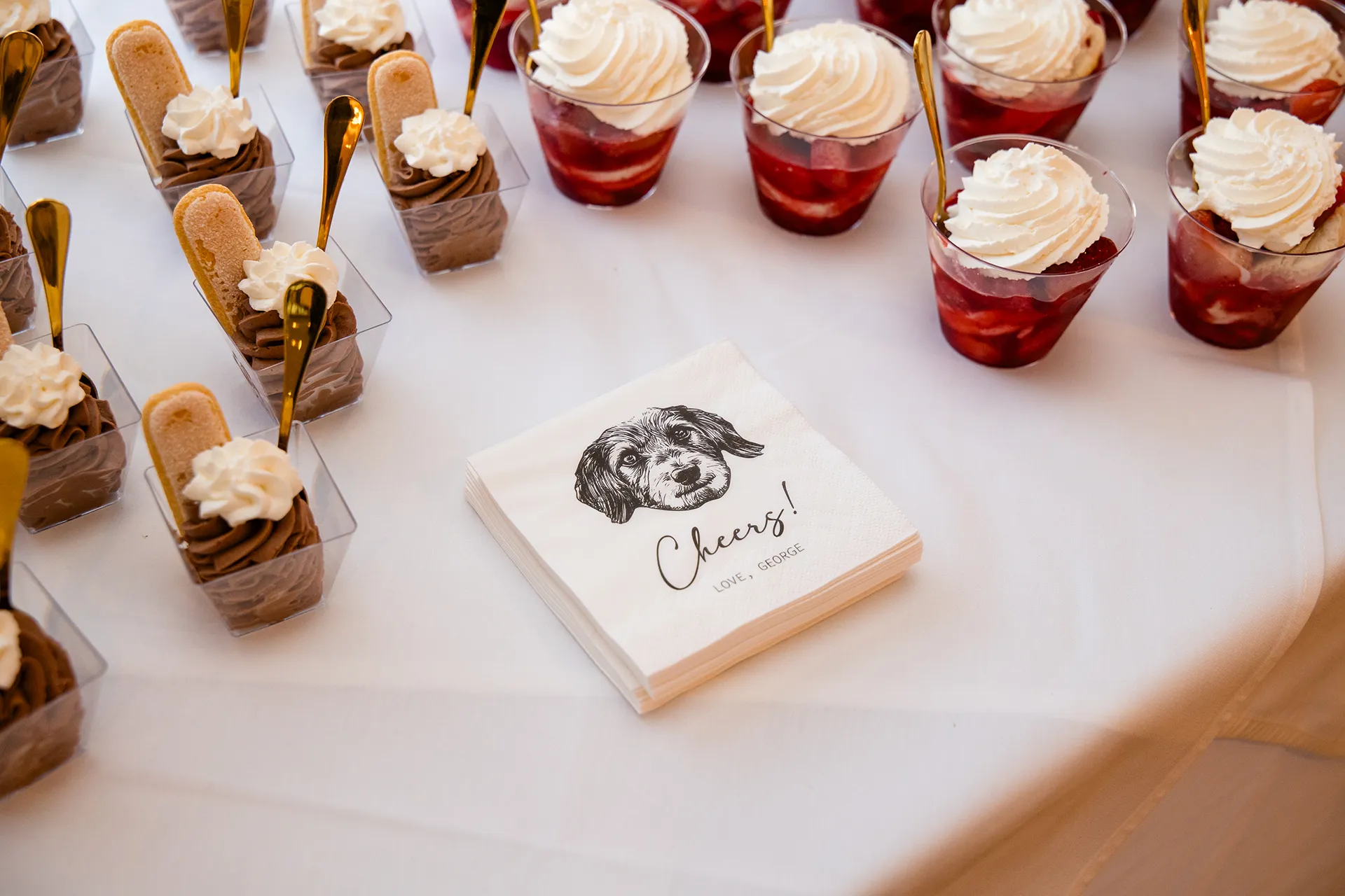 A closeup of a customized napkin of a dog's face during a wedding reception at the Atlantic Oceanside Hotel & Event Center in Bar Harbor, Maine.