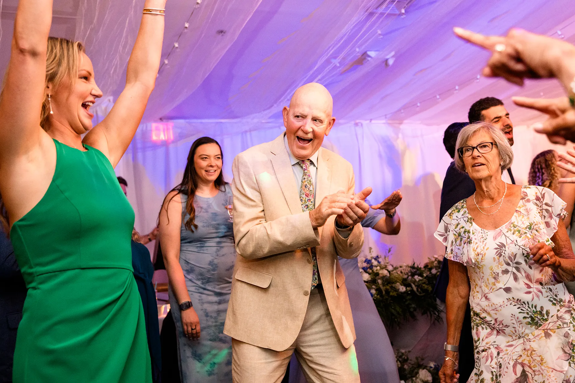 Guests laugh as they dance during a wedding reception at the Atlantic Oceanside Hotel & Event Center in Bar Harbor, Maine.