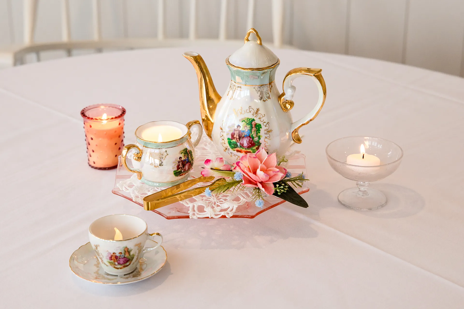 maine wedding photography bethany mike 08 A closeup of a teapot and teacups for a garden party themed wedding at the York Harbor Reading Room in Maine.