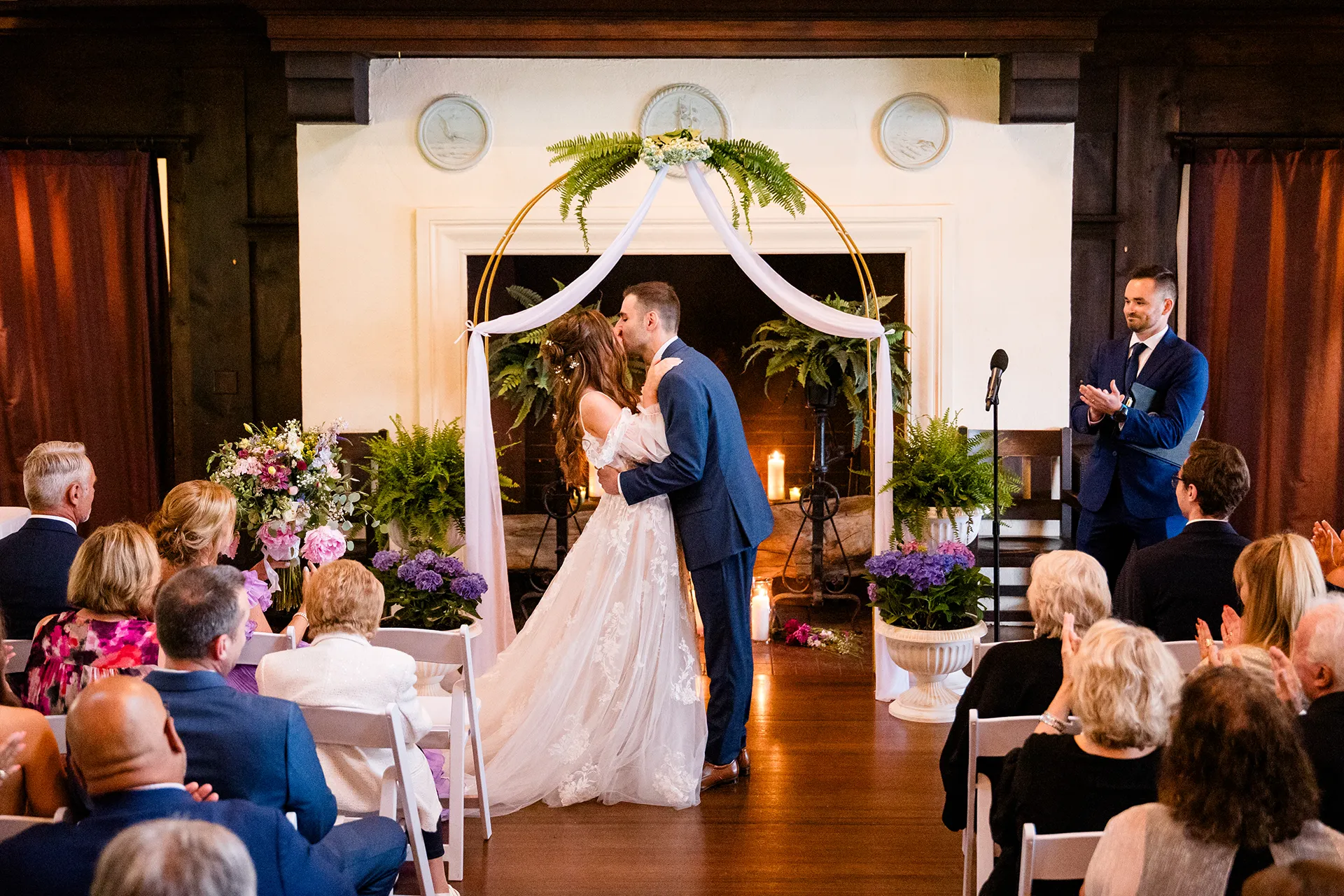 maine wedding photography bethany mike 34 A bride and groom kiss at the end of their wedding ceremony at the York Harbor Reading Room in York, Maine.