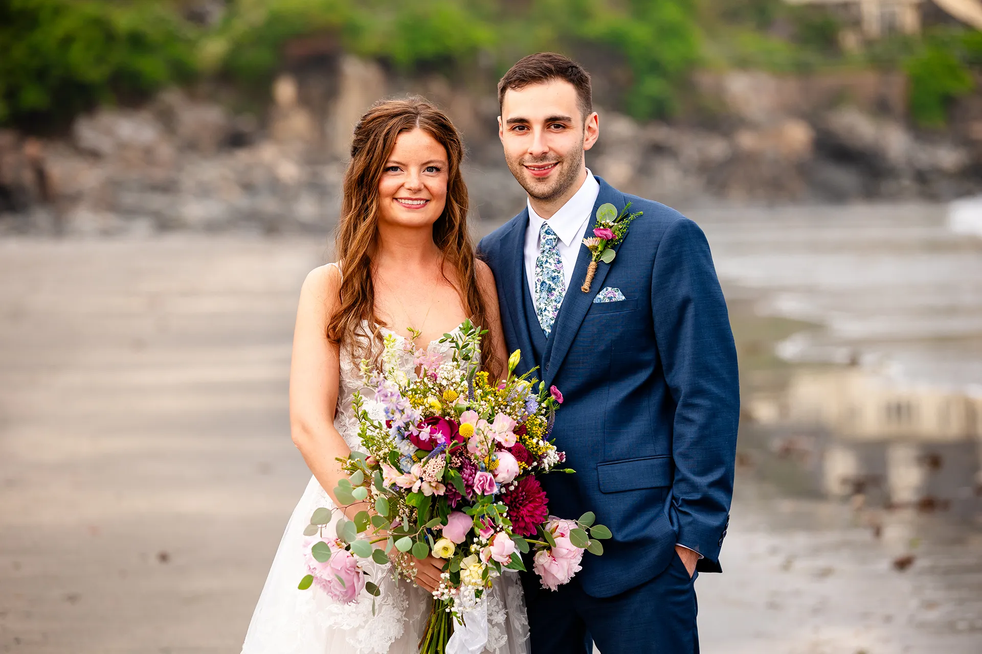 maine wedding photography bethany mike 43 A newly married smile and pose for wedding portraits on York Harbor Beach in York, Maine.