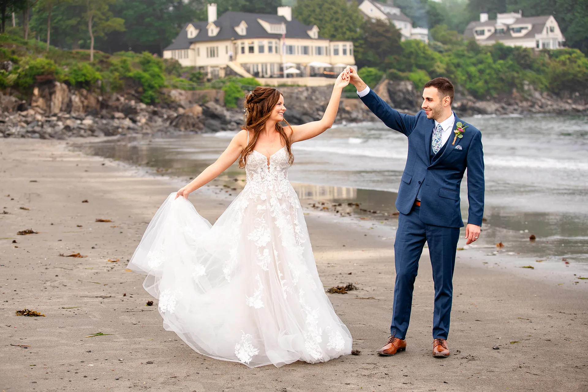 maine wedding photography bethany mike 47 A groom spins a bride during wedding portraits on York Harbor Beach in York, Maine.