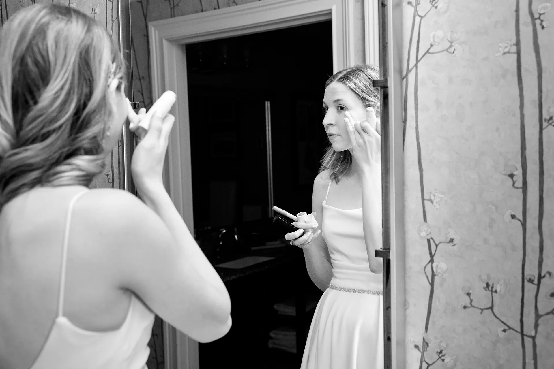 maine wedding photography caroline max 05 A bride puts on her makeup she gets ready for a wedding at the Bar Harbor Inn and Spa in Bar Harbor, Maine.