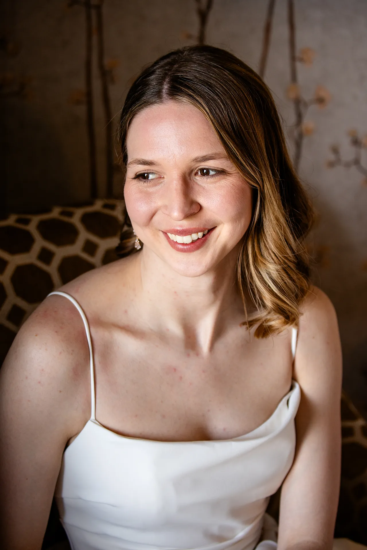 maine wedding photography caroline max 07 A bride smiles and poses during bridal portraits at the Bar Harbor Inn and Spa in Bar Harbor, Maine.