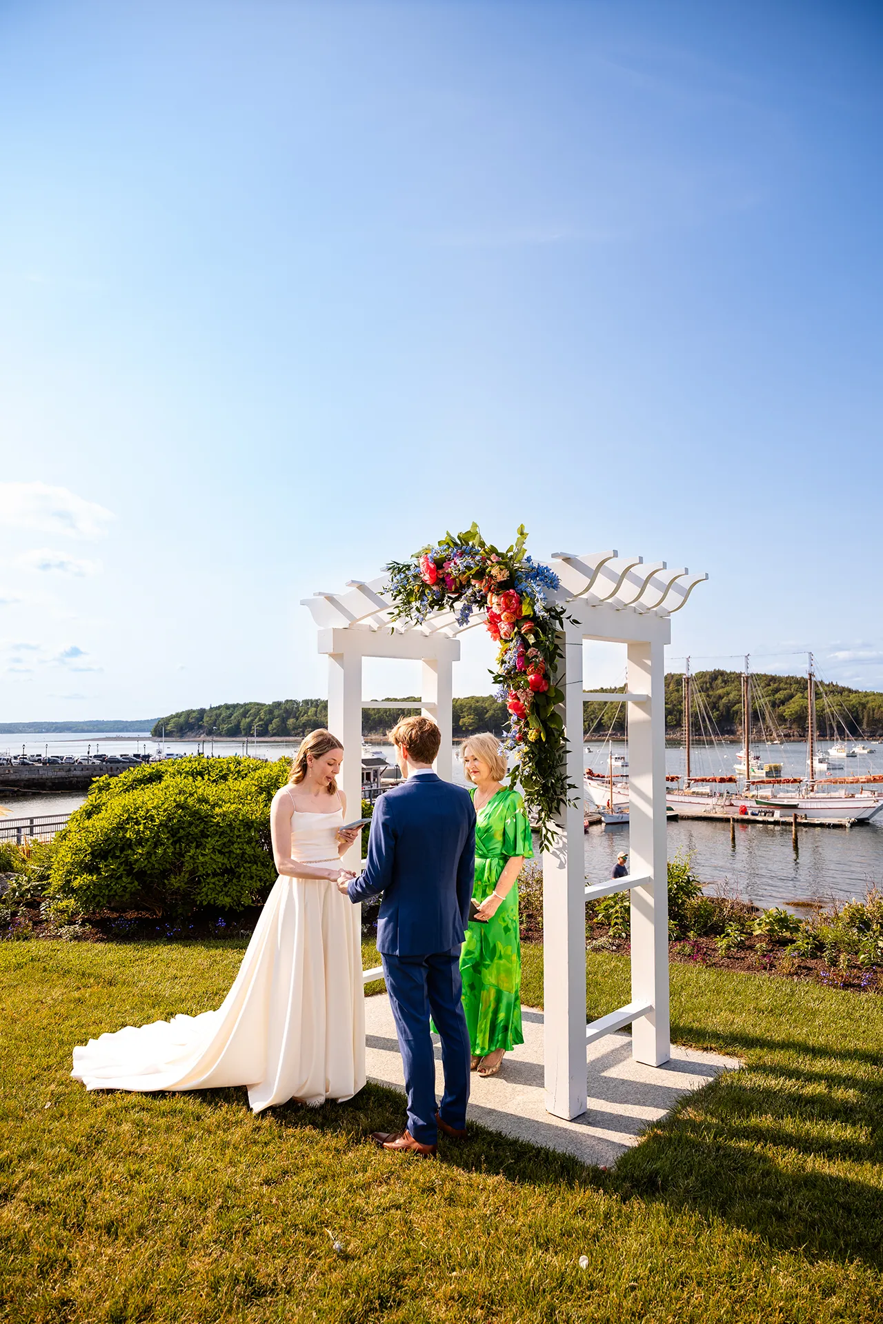 maine wedding photography caroline max 20 A bride reads her vows to a groom during a wedding ceremony at the Bar Harbor Inn and Spa in Bar Harbor, Maine.