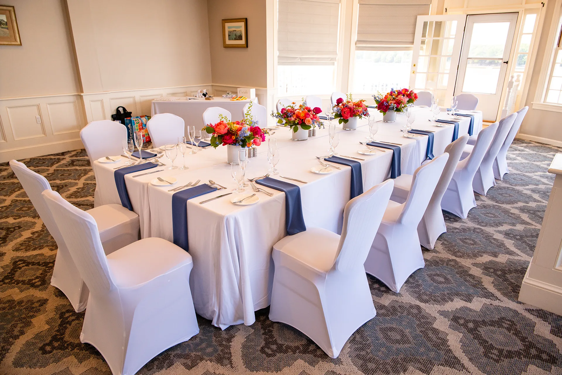 maine wedding photography caroline max 23 A wedding reception setup in the Porcupine Room at the Bar Harbor Inn and Spa in Bar Harbor, Maine.