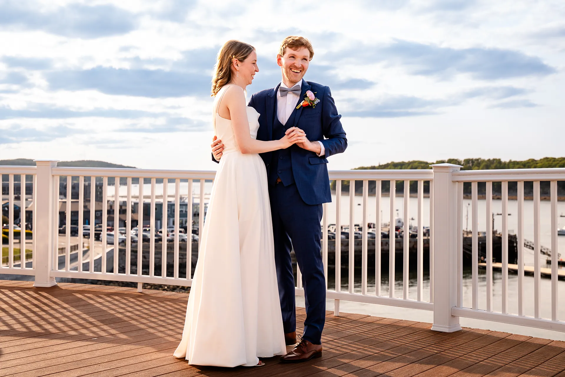 maine wedding photography caroline max 29 A bride and groom share a first dance on the deck of the Porcupine Room at the Bar Harbor Inn and Spa in Bar Harbor, Maine.