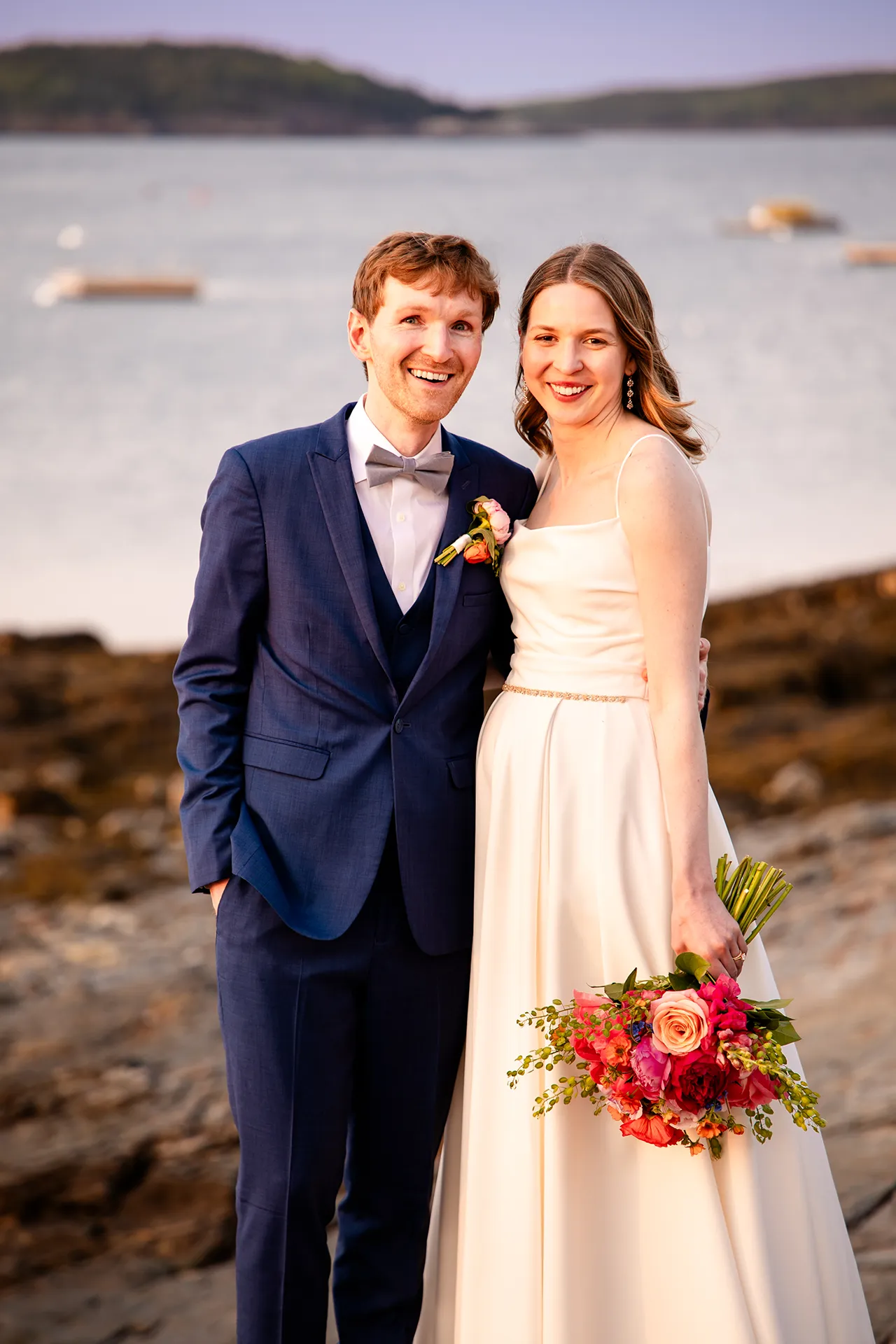 maine wedding photography caroline max 37 A bride and groom smile and pose during wedding portraits at the Bar Harbor Inn and Spa in Bar Harbor, Maine.