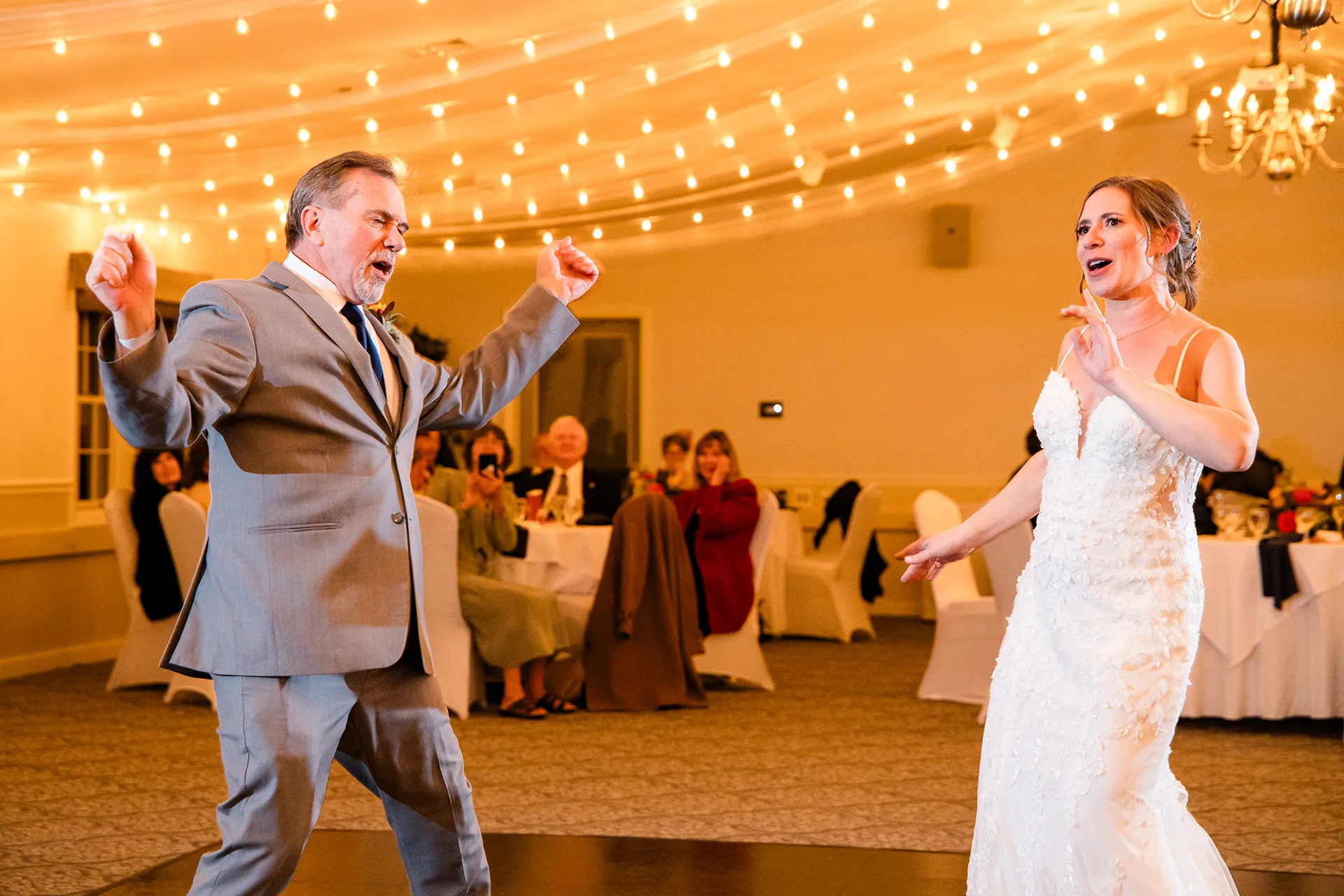 A bride and dad share a dance during a wedding reception at the Atlantic Oceanside Hotel & Event Center in Bar Harbor, Maine.