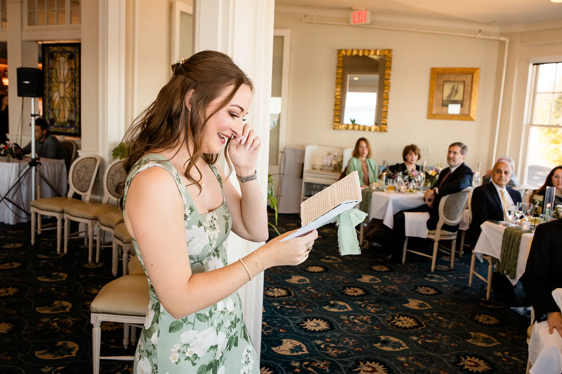A bridesmaid cries while giving a speech during a wedding reception at the Bar Harbor Inn and Spa near Acadia National Park in Maine.