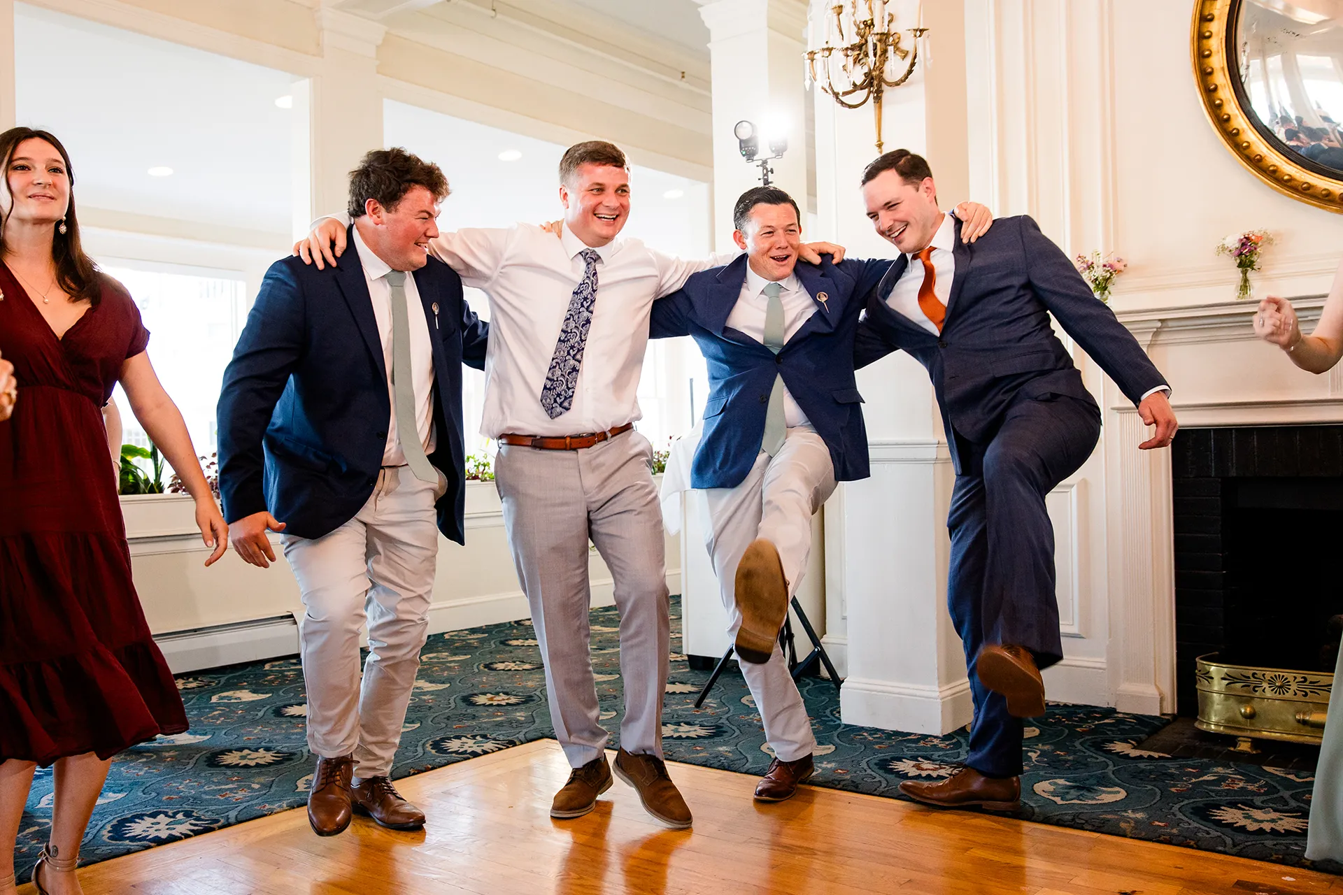 A groom dances with his groomsmen during a wedding reception at the Bar Harbor Inn and Spa near Acadia National Park in Maine.