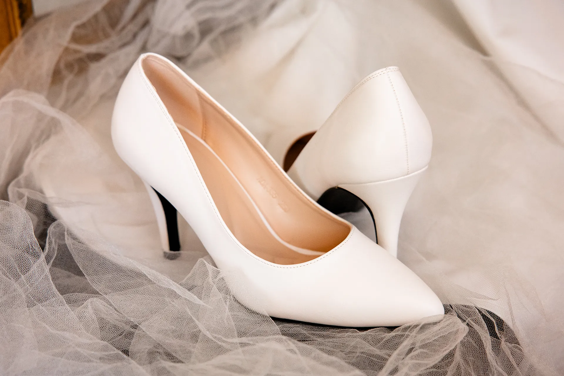 A pair of white heels at the Bar Harbor Club near Acadia National Park in Maine.