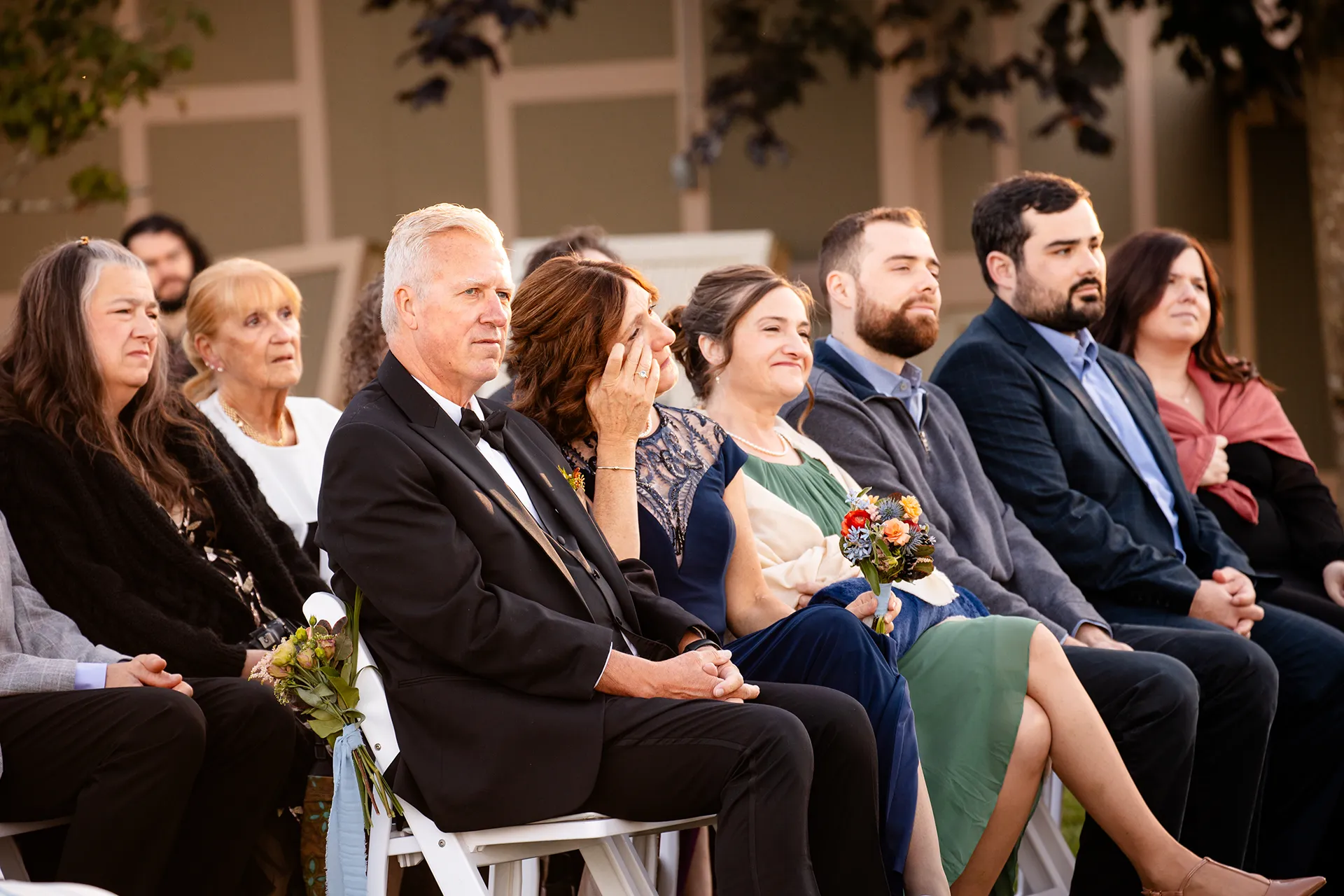 A mom cries while she watches a wedding ceremony at the Bar Harbor Club near Acadia National Park in Maine.