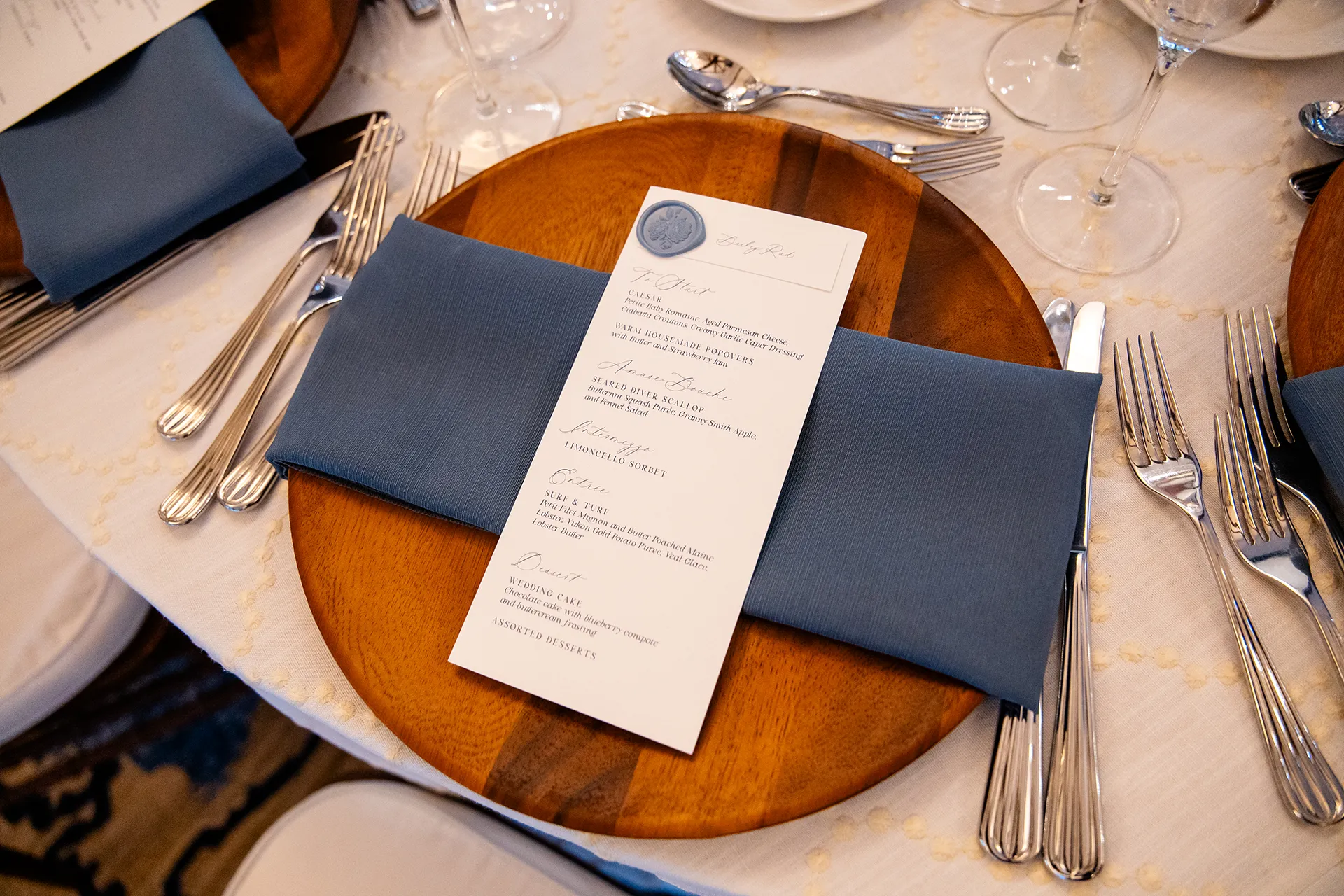 A closeup of a table setting for a wedding reception at the Bar Harbor Club near Acadia National Park in Maine.
