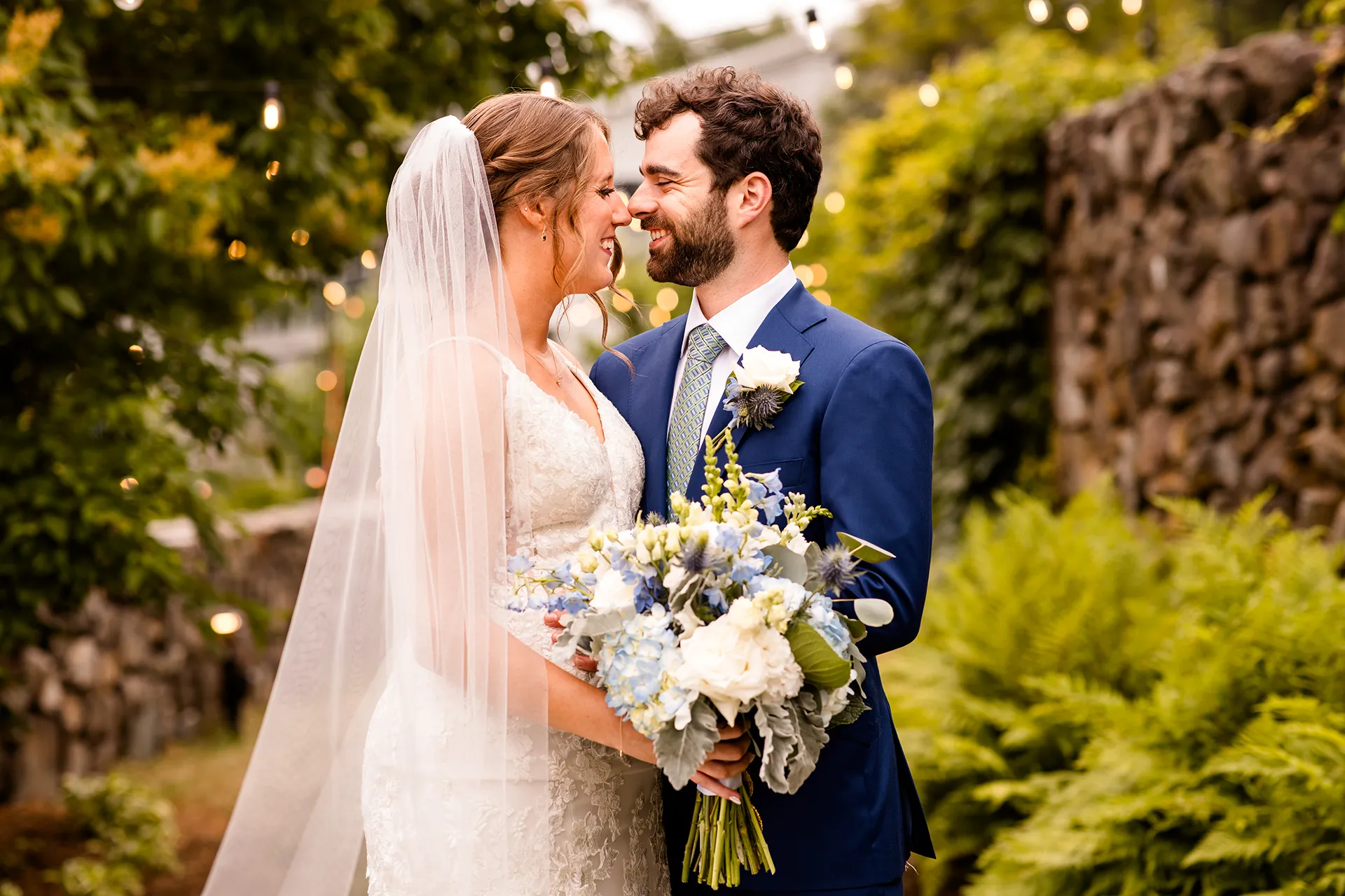 maine wedding photography meghan phil 24 A bride and groom rub noses and smile during wedding portraits at the Atlantic Oceanside Hotel & Event Center in Bar Harbor, Maine.
