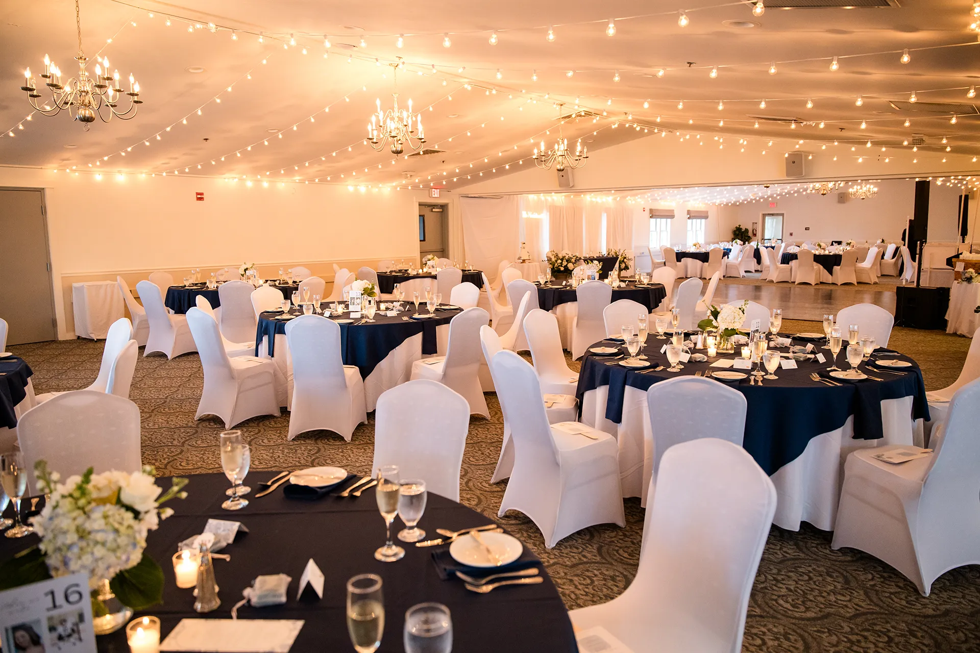 maine wedding photography meghan phil 41 A setup for a wedding reception at the Atlantic Oceanside Hotel & Event Center in Bar Harbor, Maine.