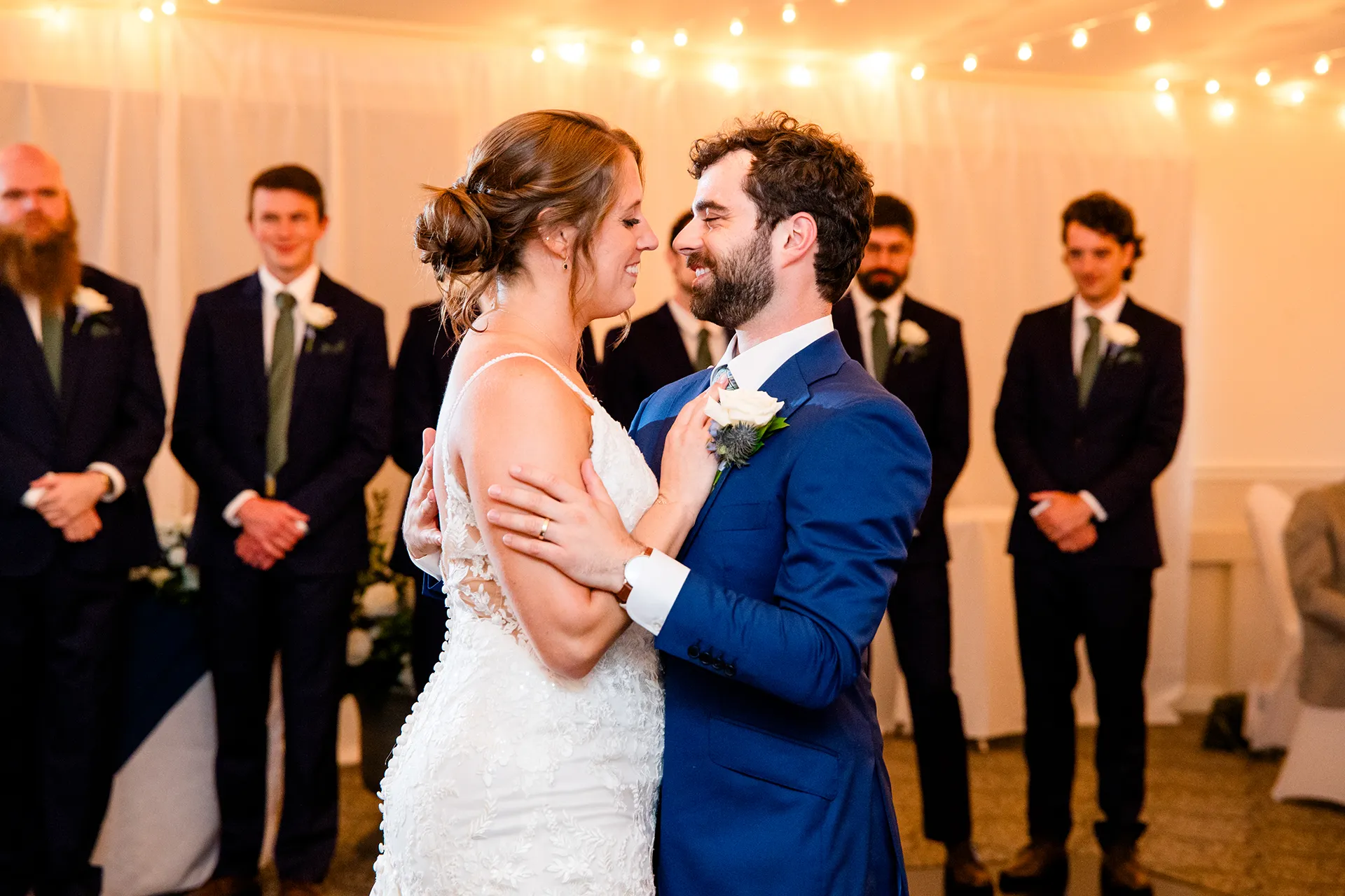 maine wedding photography meghan phil 44 A bride and groom smile at each other while they dance during a wedding reception at the Atlantic Oceanside Hotel & Event Center in Bar Harbor, Maine.
