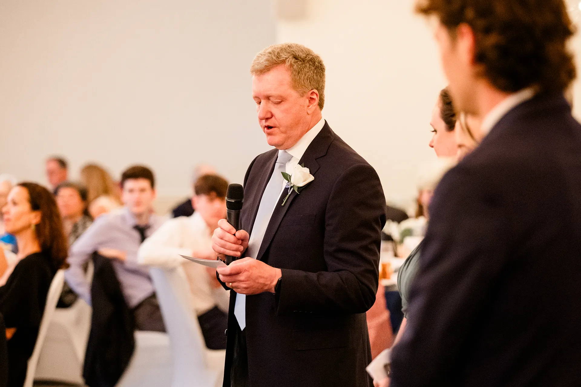 maine wedding photography meghan phil 46 A dad gives a toast during a wedding reception at the Atlantic Oceanside Hotel & Event Center in Bar Harbor, Maine.