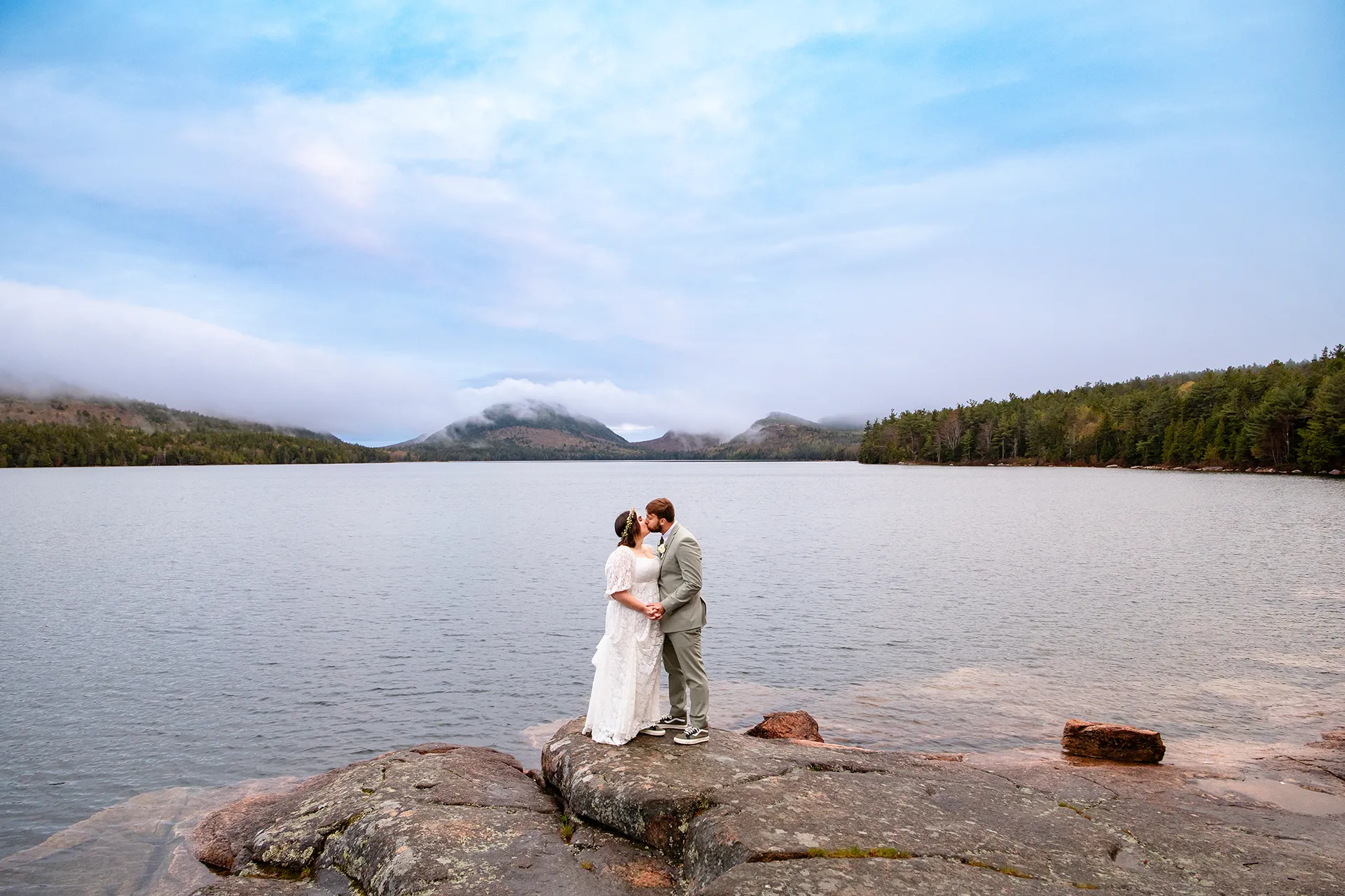 maine wedding photography mystic andrew 09 A bride and groom kiss in front of Eagle Lake during wedding portraits in Acadia National Park near Bar Harbor, Maine.