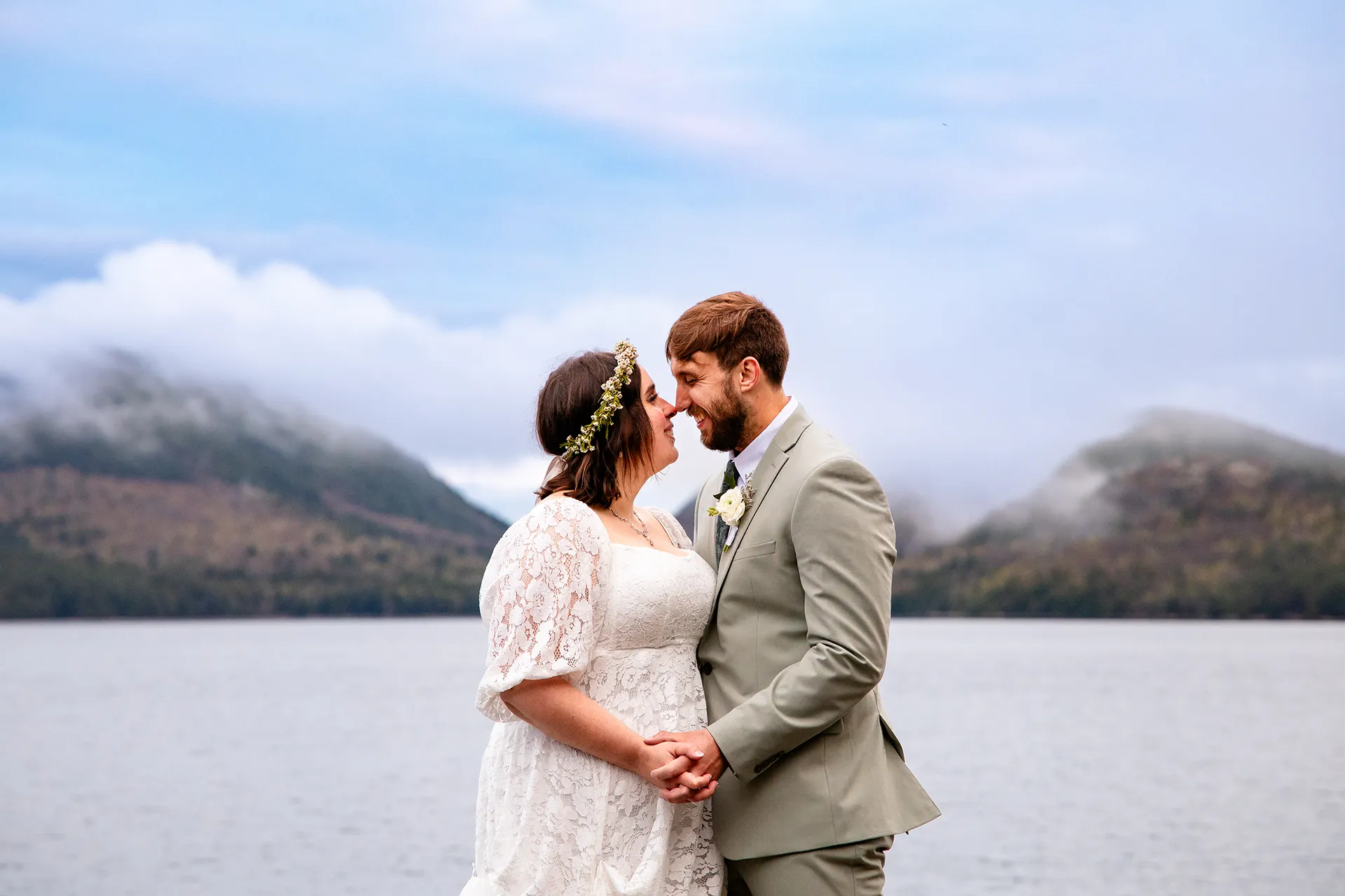 maine wedding photography mystic andrew 11 A bride and groom rub noses during wedding portraits at Eagle Lake in Acadia National Park near Bar Harbor, Maine.