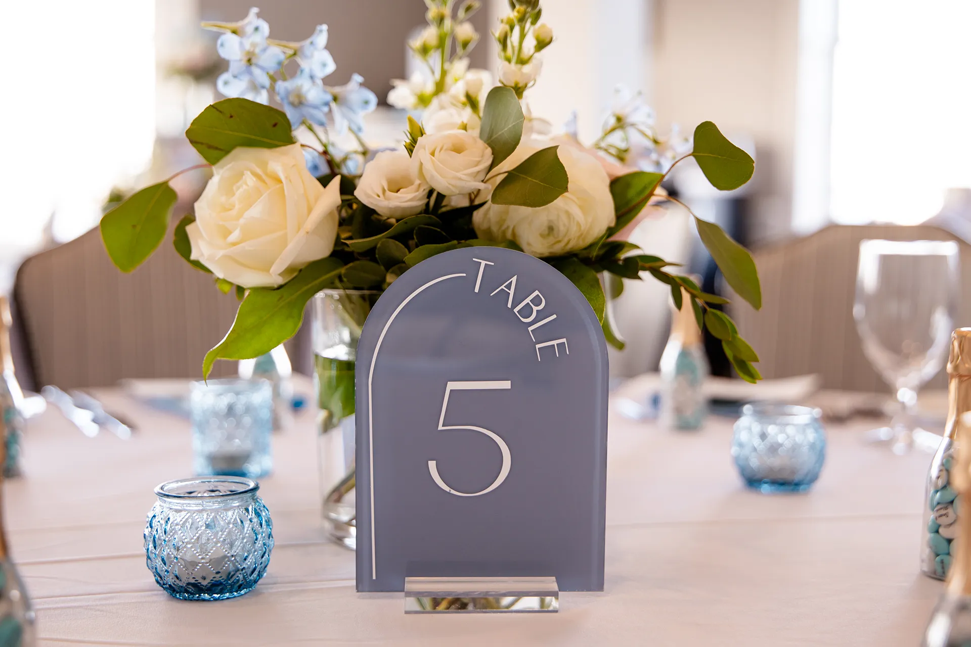 A closeup of a table number for a wedding reception in the Porcupine Room at the Bar Harbor Inn and Spa in Bar Harbor, Maine.
