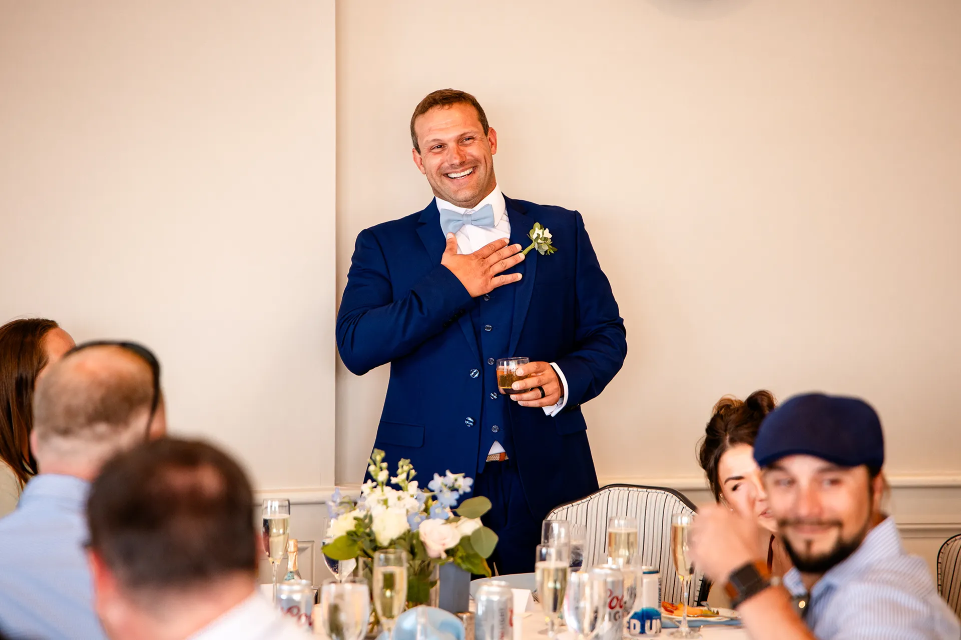 A best man gives a toast during a wedding reception in the Porcupine Room at the Bar Harbor Inn and Spa in Bar Harbor, Maine.