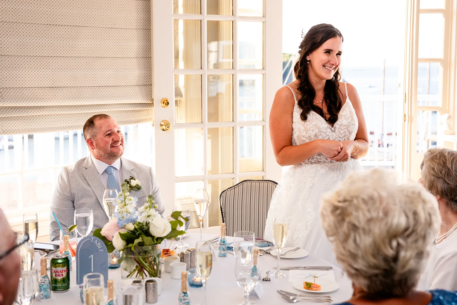 A bride gives a toast during a wedding reception in the Porcupine Room at the Bar Harbor Inn and Spa in Bar Harbor, Maine.