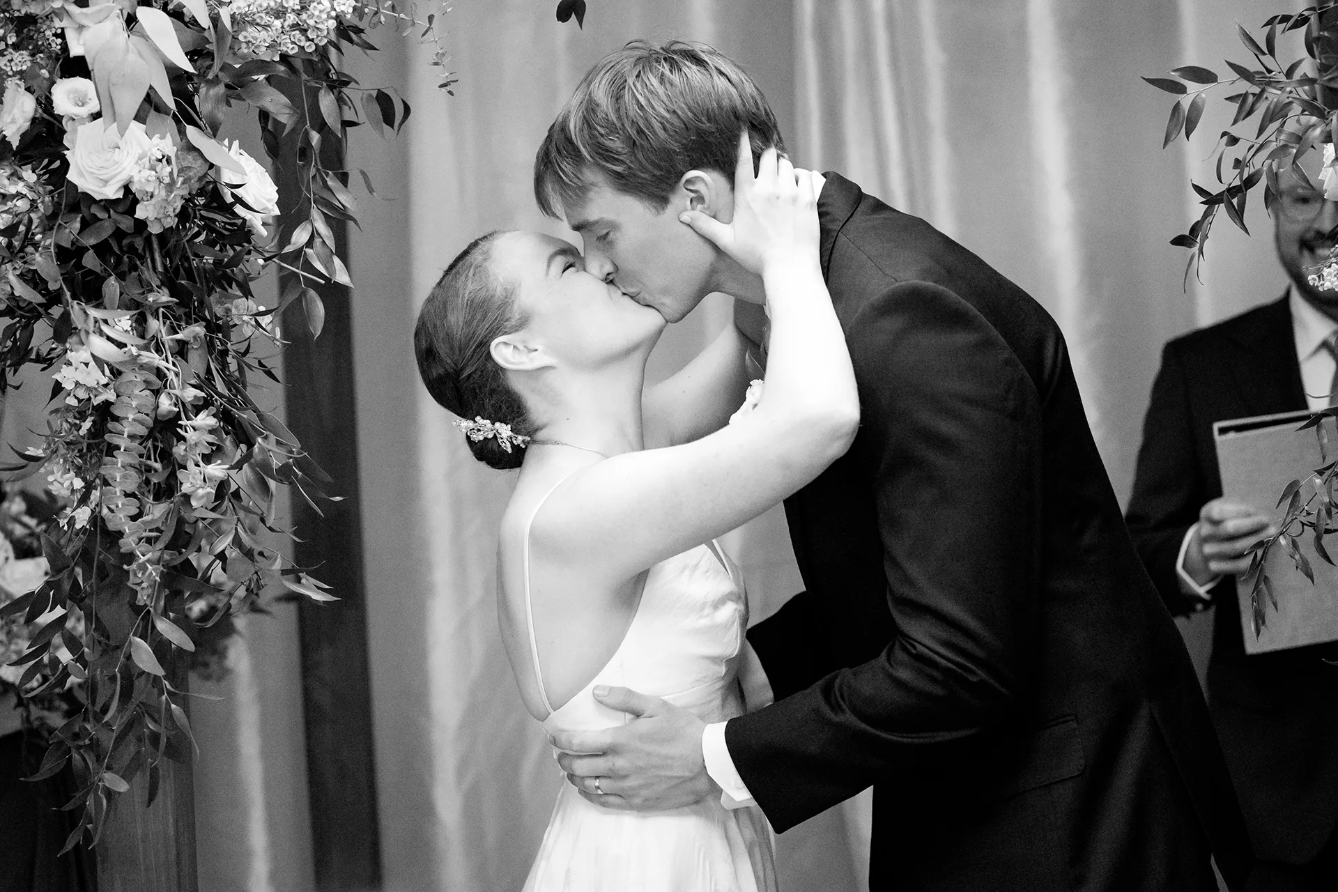 A newly married couple kiss during a wedding ceremony at the Nonantum Resort in Kennebunkport, Maine.
