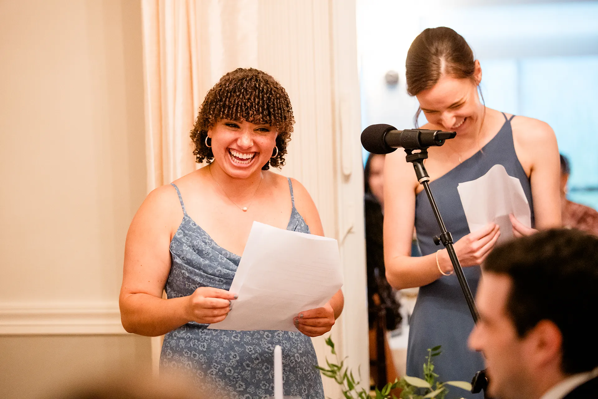 Bridesmaids laugh as they give a toast during a wedding reception at the Nonantum Resort in Kennebunkport, Maine.